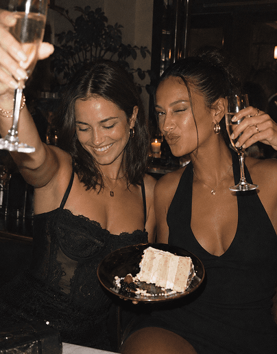 Friends celebrating together over cake